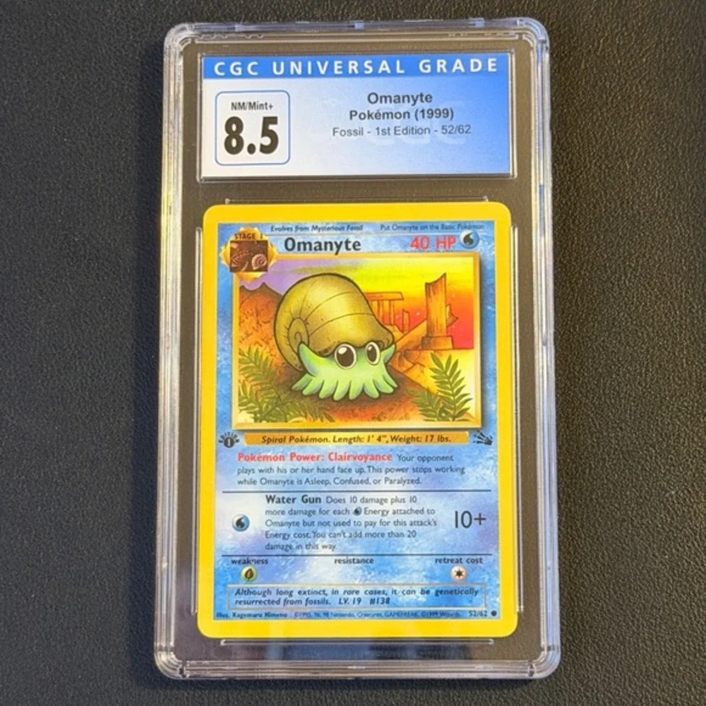 Pokemon Omanyte 1st Edition Fossil 52/62 CGC 8.5 NM/Mint+ TCG 1999 WOTC Vintage